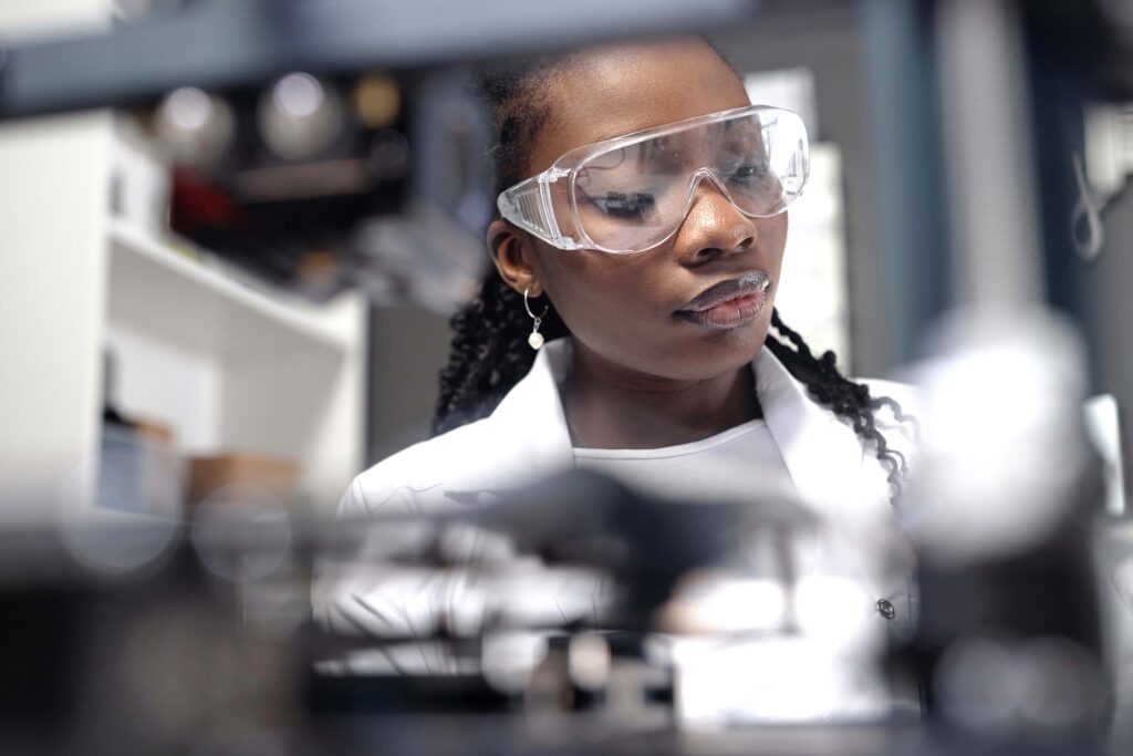 internship icon banner black student working in lab